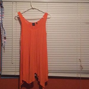 A flowy orange tank top